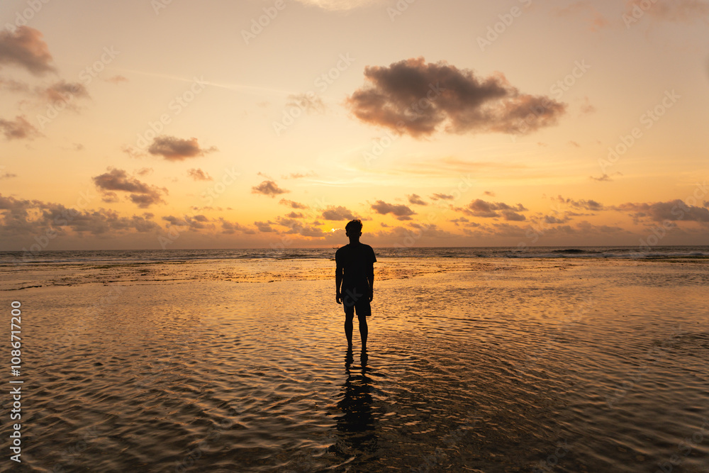 visitors are enjoying the sunset on the coast. enjoying a holiday on the beach visitors are enjoying the sunset on the coast. enjoying a holiday on the beach