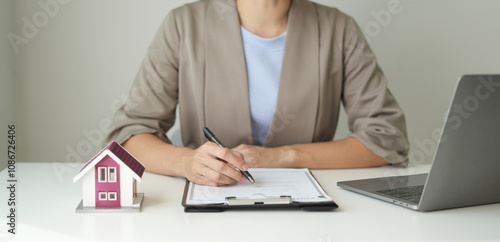 Принти на полотні agents working in real estate investment and home insurance signing contracts in