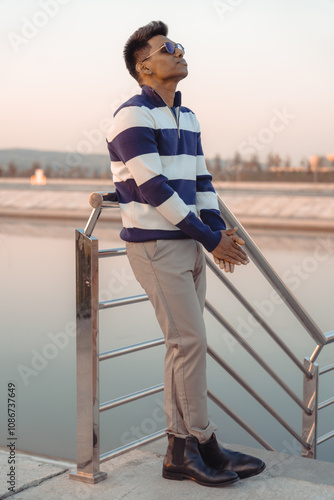 A man in a striped sweater