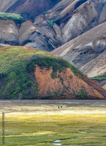 Hikers in Landmannalaugar's Vibrant Landscape photo