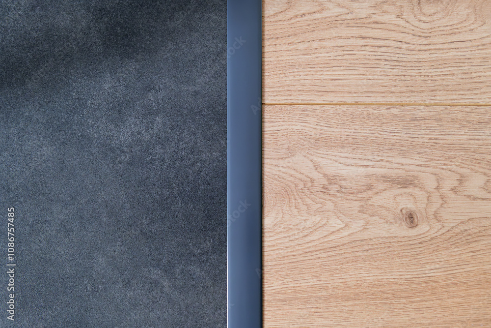 Anthracite expansion strip between ceramic tiles and floor panels. Aesthetic floor finishing. finishing strip. Interior