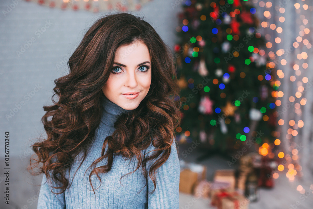 Beautiful smiling woman model, healthy long hair style over christmas tree lights background. Beautiful smiling woman model, healthy long hair style over christmas tree lights background.
