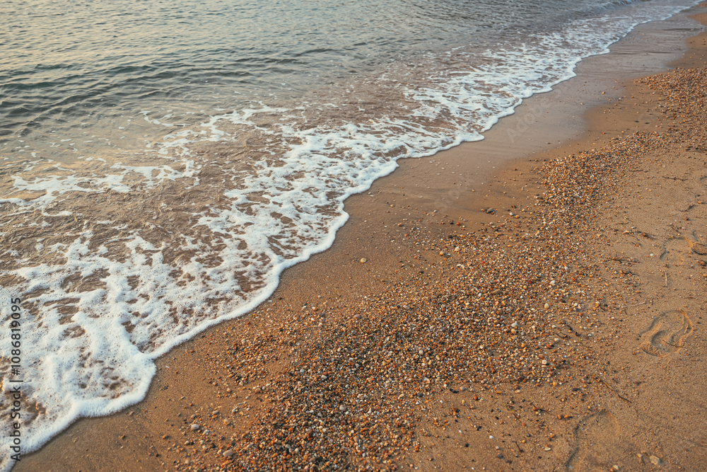 Vrasna beach in summer, Aegean sea waves at the shoreline Vrasna beach in summer, Aegean sea waves at the shoreline