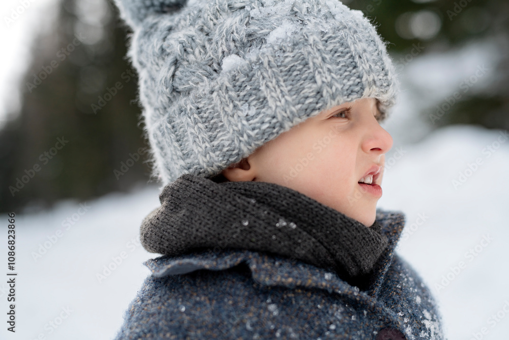 Portrait of small boy enjoying winter holiday in the mountains with family, playing in snow. Portrait of small boy enjoying winter holiday in the mountains with family, playing in snow.