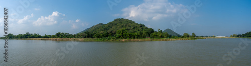 Panorama of hill in middle of the lake