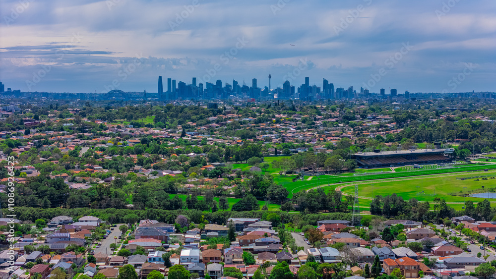 Naklejka premium Panoramic aerial drone view of western Sydney Suburbs of Canterbury Burwood Ashfield Marrickville Campsie with Houses roads and parks in Sydney New South Wales NSW Australia