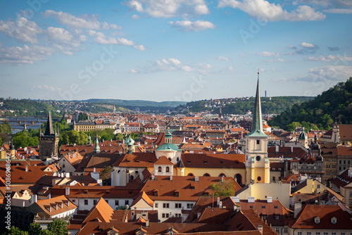 Scenic View of Prague with Red Rooftops and Church Spires