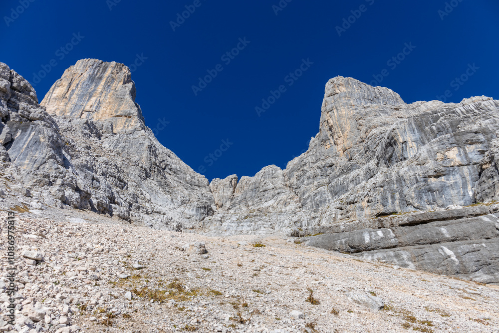 Monte Civetta in the Dolomites is a prominent mountain known for its vertical rock walls and alpine beauty. Ideal for photography, it features rugged peaks, dramatic cliffs, and scenic natural landsca Monte Civetta in the Dolomites is a prominent mountain known for its vertical rock walls and alpine beauty. Ideal for photography, it features rugged peaks, dramatic cliffs, and scenic natural landsca