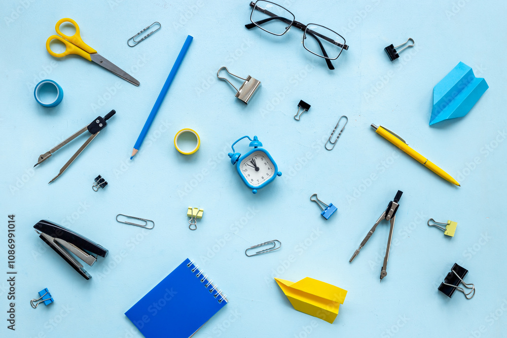 Creative pattern of school supplies and stationery, top view Creative pattern of school supplies and stationery, top view
