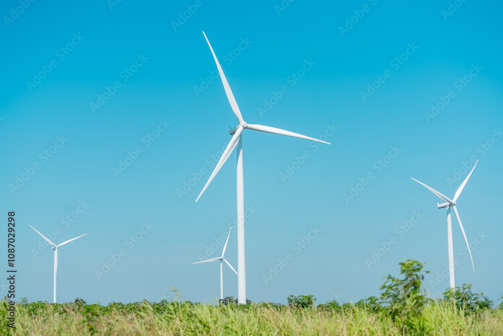 Windmills for electric power production, summer field, renewable energy Windmills for electric power production, summer field, renewable energy