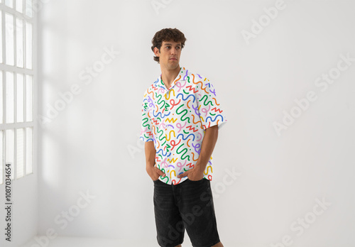 Mockup Of Man Wearing Customized Shirt In Studio