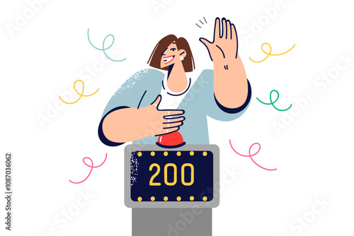 Woman participating in TV show with quiz game raises hand to press button, stands near point counter