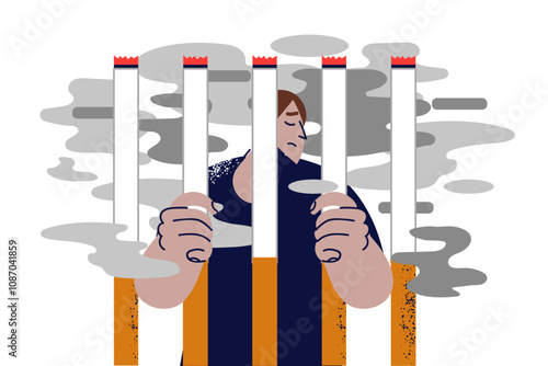 Man addicted to smoking tobacco is locked behind bars of cigarettes, demonstrating powerlessness