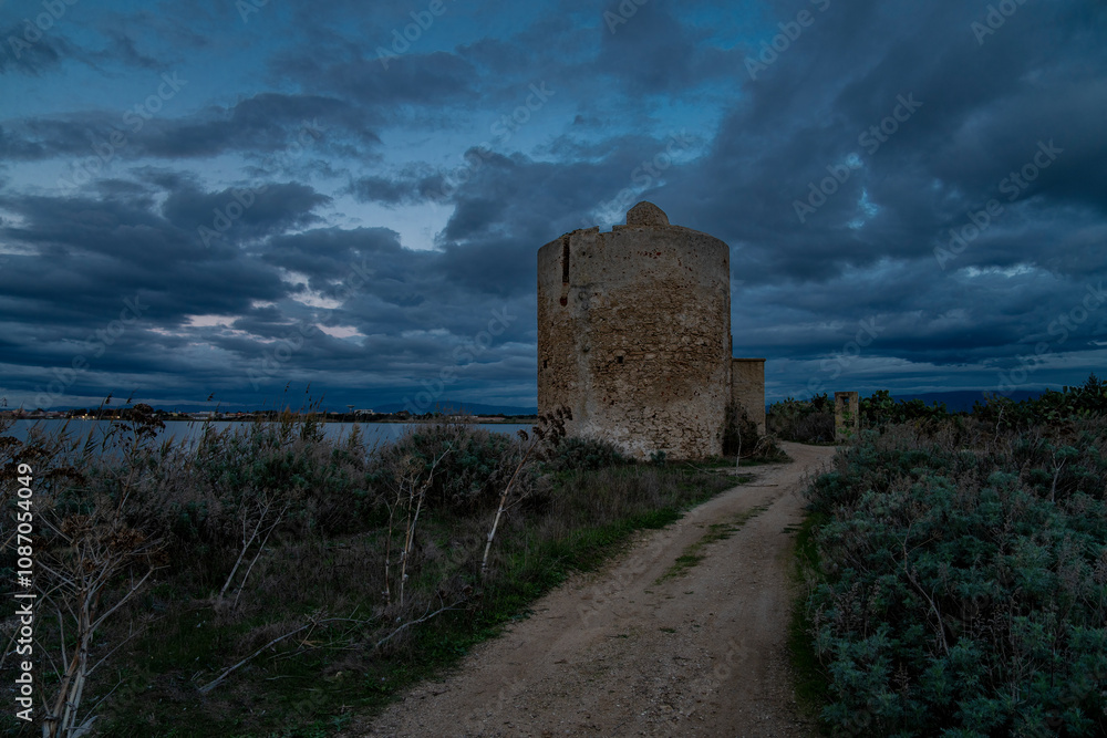 old historic tower at sunset old historic tower at sunset
