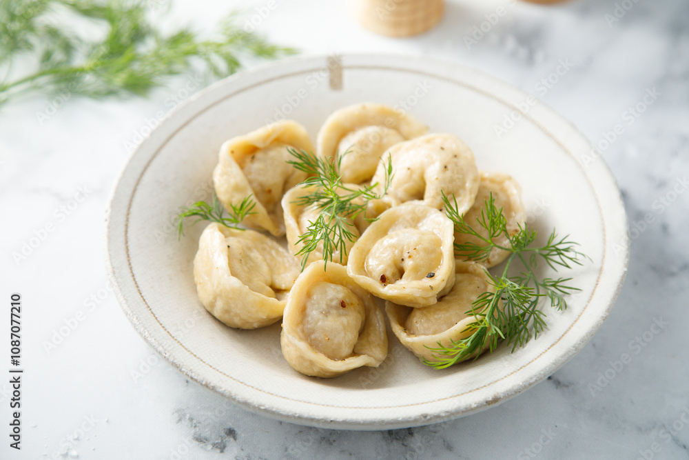 Homemade dumplings with butter and dill Homemade dumplings with butter and dill