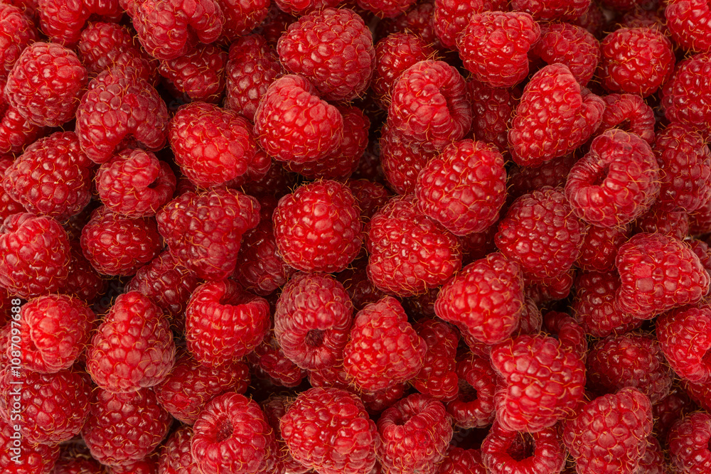 Tasty fresh raspberry as a background. Tasty fresh raspberry as a background.