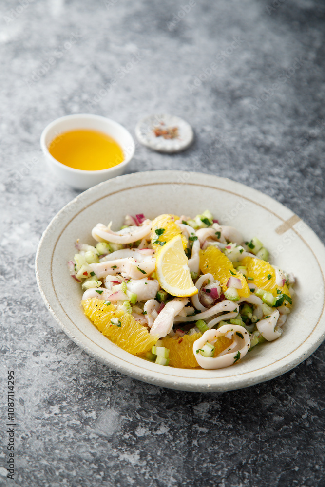 Squid salad with orange and red nion Squid salad with orange and red nion
