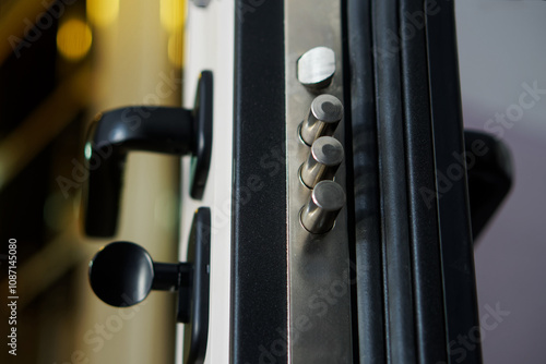 Photos Door lock bolts on an open armored entrance door