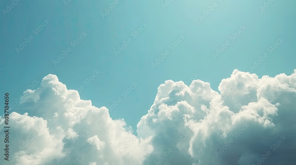 Timelapse captures dynamic clouds drifting through a clear blue sky, illustrating the fluidity of time and nature. The timelapse evokes a sense of tranquility, with ample copy space. Timelapse captures dynamic clouds drifting through a clear blue sky, illustrating the fluidity of time and nature. The timelapse evokes a sense of tranquility, with ample copy space.