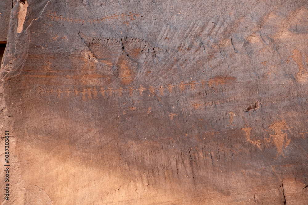 Naklejka premium Detail of indigenous culture Petroglyphs etch in the walls along Potash Road in Moab Utah