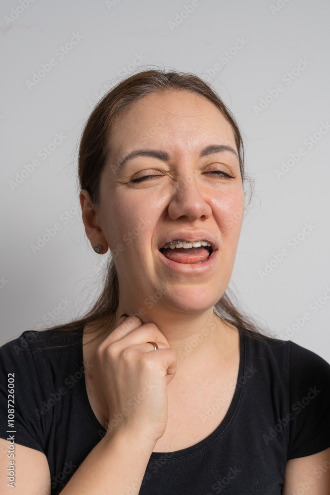 Young cheerful woman does hygiene for braces Young cheerful woman does hygiene for braces