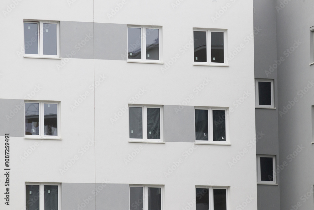 Multi-family apartment block with lots of windows