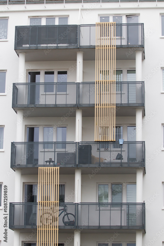 Multi-family apartment block with lots of windows