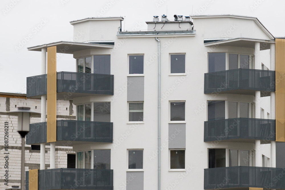 Multi-family apartment block with lots of windows
