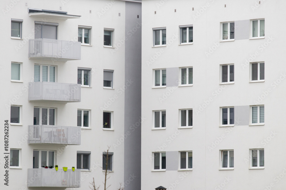 Multi-family apartment block with lots of windows
