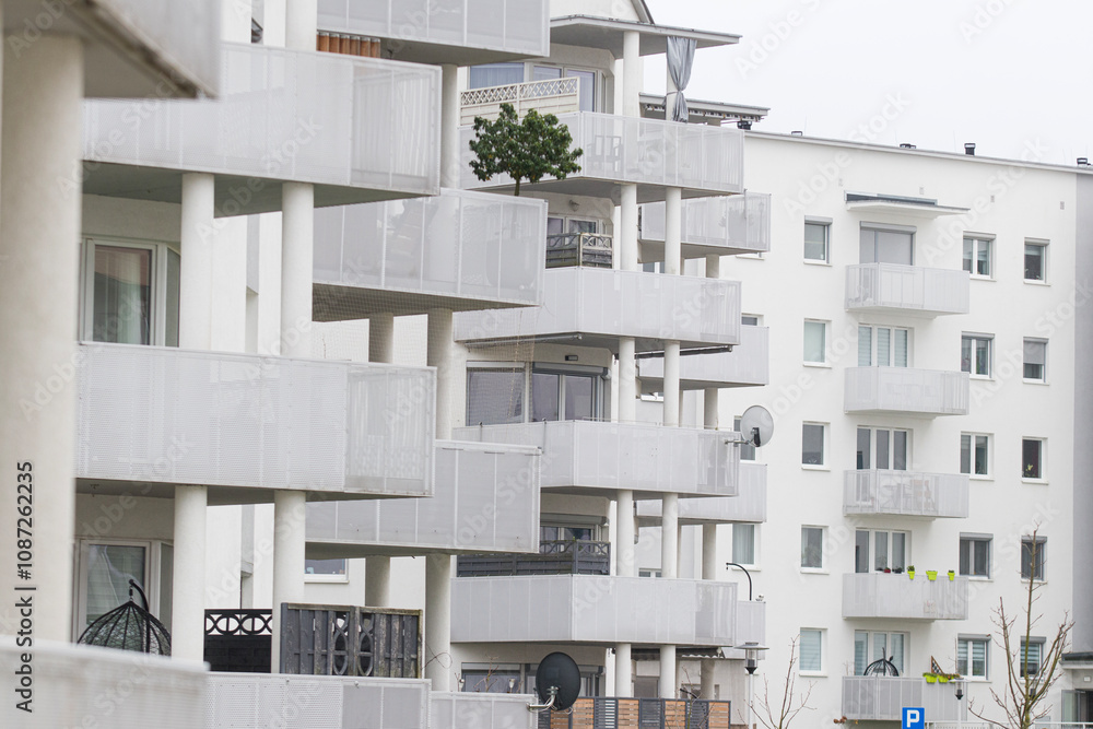 Multi-family apartment block with lots of windows