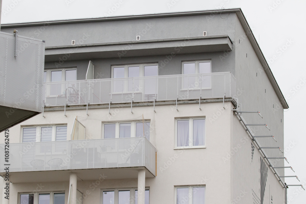 Multi-family apartment block with lots of windows