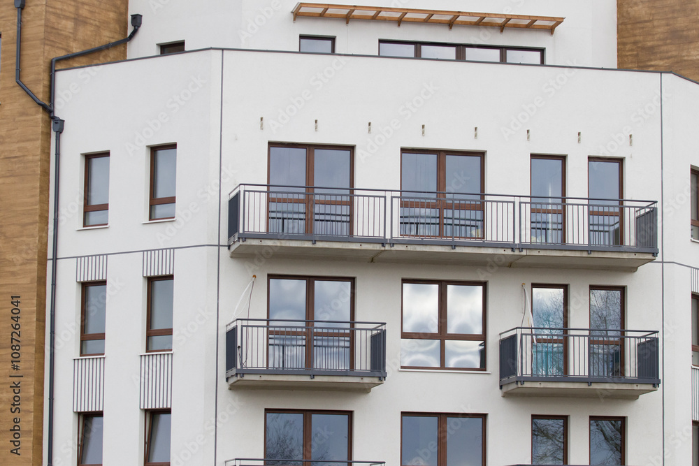 Multi-family apartment block with lots of windows