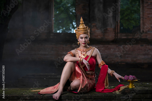 woman in costume.  Person  in vintage Thai traditional Theme the Empress of Ayodhaya, Ayutthaya ,Thailand. photo