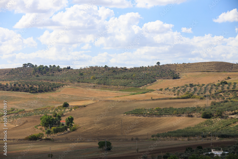 Road to Gravina in Puglia on a sunny summer day, province of Bari, Apulia, southern Italy. Road to Gravina in Puglia on a sunny summer day, province of Bari, Apulia, southern Italy.