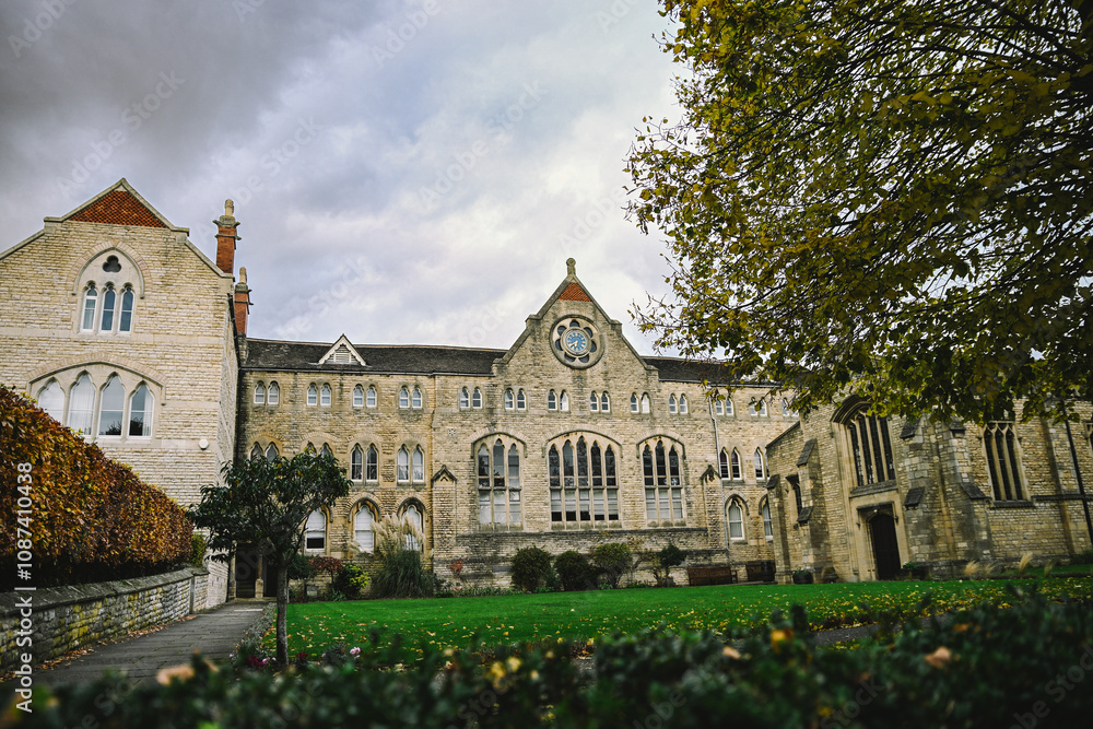 Beautiful English Street in Stamford with Lincolnshire Limestone Houses and Buildings in the Autumn, quintessential town and city in England Beautiful English Street in Stamford with Lincolnshire Limestone Houses and Buildings in the Autumn, quintessential town and city in England