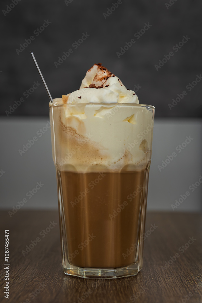 Coffee drink with whipped cream and cinnamon. Home made beverage background Coffee drink with whipped cream and cinnamon. Home made beverage background