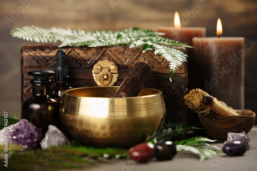 Golden Singing Bowl with Spiritual Tools and Crystals photo