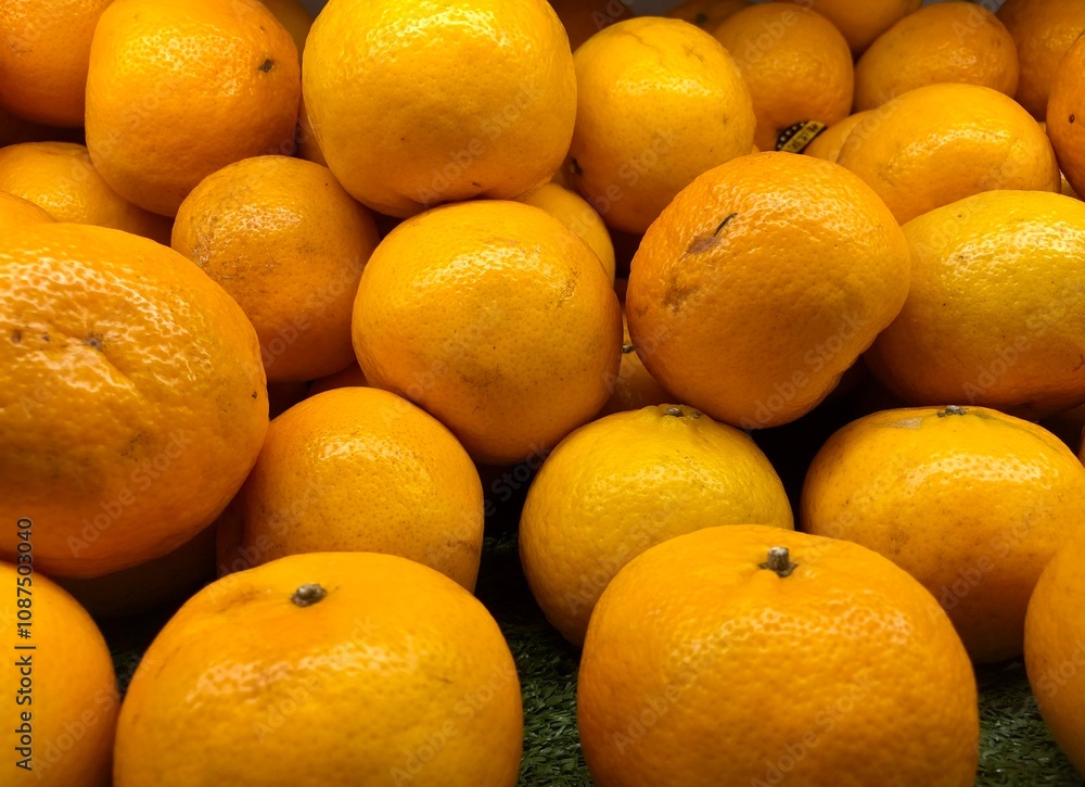 Mandarin oranges in the supermarket in close-up photos can be used as a background for oranges Mandarin oranges in the supermarket in close-up photos can be used as a background for oranges