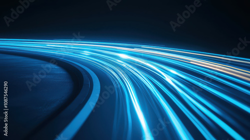 Abstract motion trails of blue light on a dark background, creating a dynamic and energetic atmosphere for creative projects.