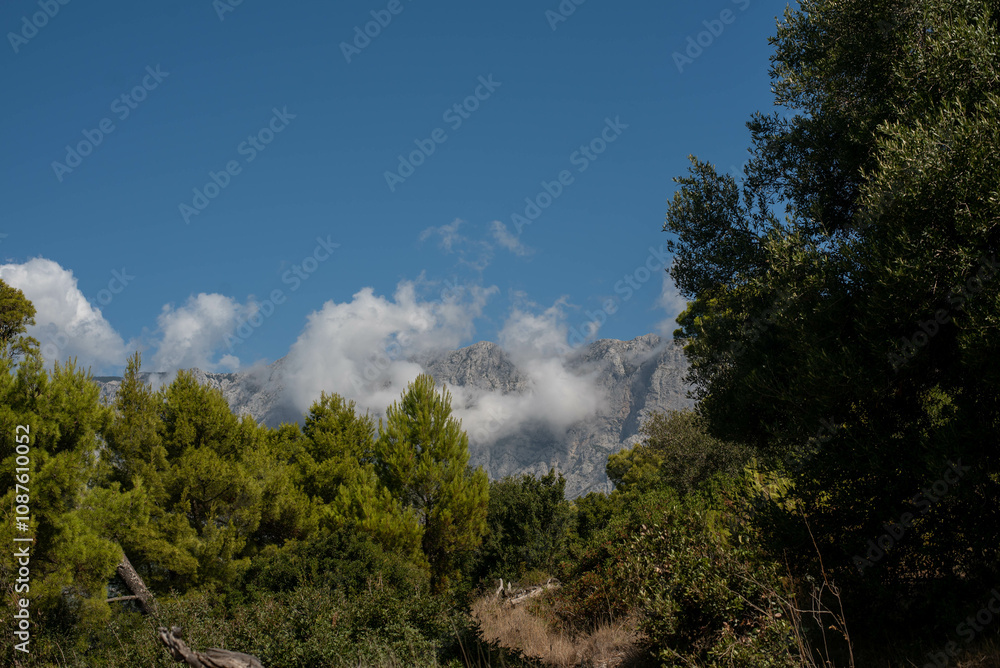 Majestic view of mountains surrounding the Makarska region, Croatia, with stunning natural landscapes Majestic view of mountains surrounding the Makarska region, Croatia, with stunning natural landscapes