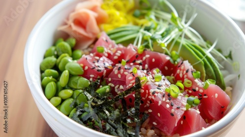 A colorful poke bowl filled with fresh diced tuna, avocado