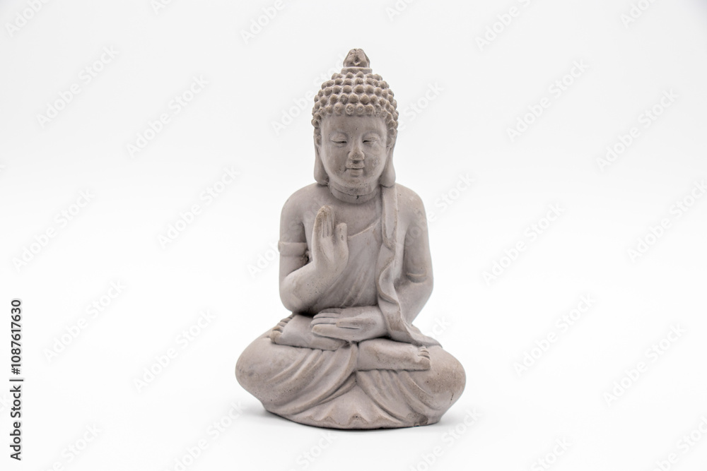 Serene Stone Buddha Statue in a Meditative Pose Against a Minimalist White Background Serene Stone Buddha Statue in a Meditative Pose Against a Minimalist White Background
