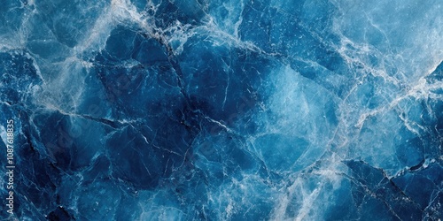 Cool blue marble background texture featuring a simple yet distinct design that emphasizes the cold aesthetic of blue marble tones. Ideal for showcasing blue marble in various creative projects.