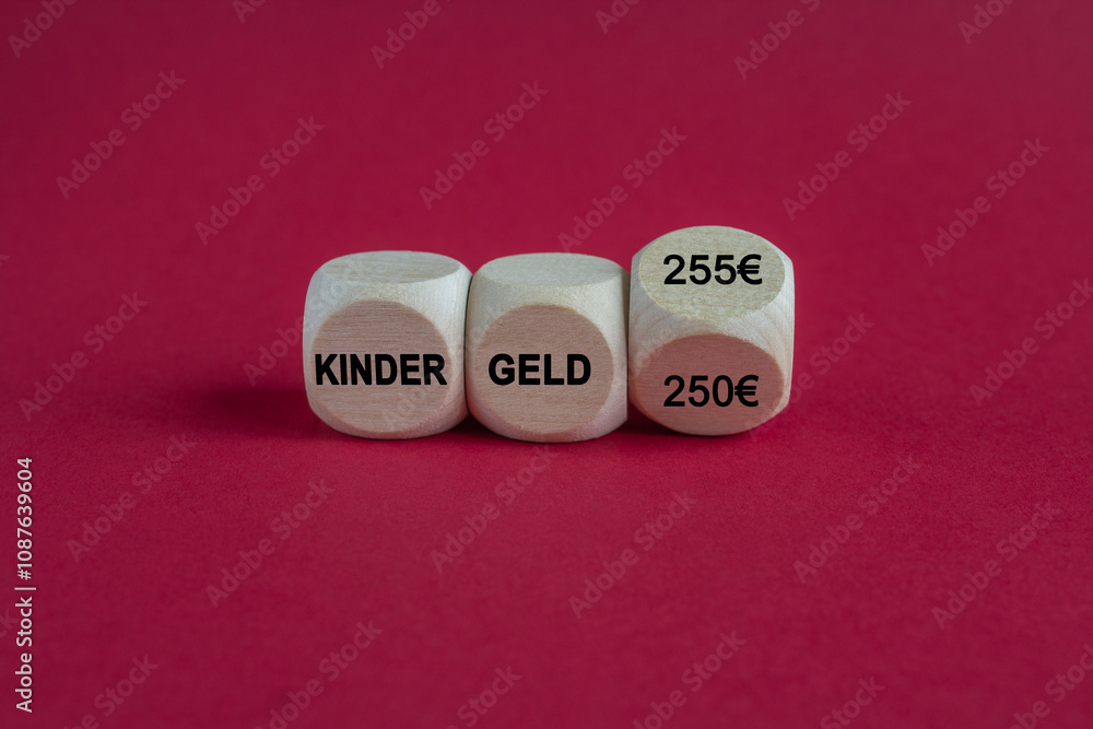 Turned cube and changes the German expression 'Kindergeld 250 EUR' (child support 250 euro) to 'Kindergeld 255 EUR' (child support 255 euro). Symbol for the increase in child support in Germany