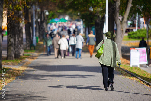 Wallpaper Mural An elderly woman walks on the spa promenade. Torontodigital.ca