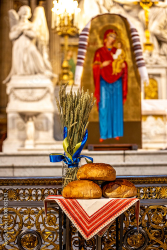 Liturgy commemorating and honoring the victims of the 1932-1933 Holodomor and the Russian-Ukrainian war started in 2014 in the Madeleine basilica, Paris, France. Bread and wheat