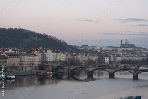 Prague, Czech Republic. Jiraskuv Bridge over Vltava river in Prague, Czech Republic. The sunrise with Castle. photo