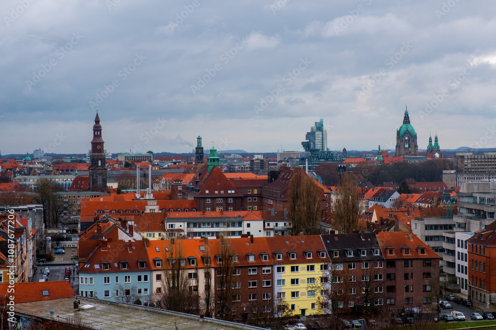 Obraz premium Hanover, Germany. Aerial view of Hanover, Germany skyline during the cloudy sunset. Time-lapse of historical landmarks in the city, panning video 