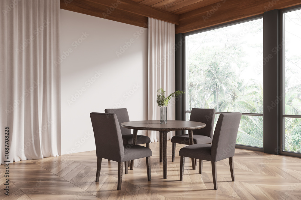 Fototapeta premium Modern dining room with circular wooden table and four chairs in natural light and minimalist design. 3D Rendering