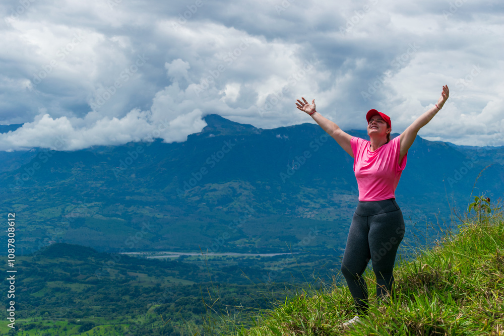 Latina woman hiker enjoys the mountains in Colombia Latina woman hiker enjoys the mountains in Colombia